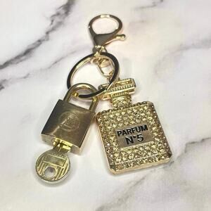 Louis Vuitton Lock & Key #220 w/ a Gold Rhinestone Parfum Bottle Charm Keychain